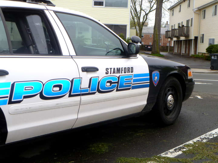 A convicted felon has been arrested again after holding people at gunpoint in a Stamford home.