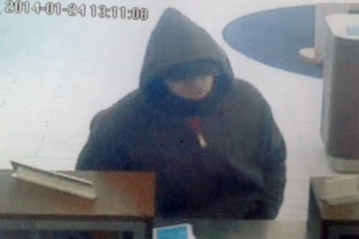 Two men are under arrest in connection with a Jan. 24 bank robbery at First Niagara Bank in Ridgefield.