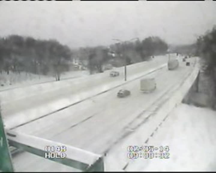 Traffic is light on I-84 in Danbury at Exit 6. The highway is closed at the New York border. 