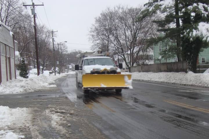 Plow crews were driving all around Norwalk Wednesday to clear out many snowed-in roads.