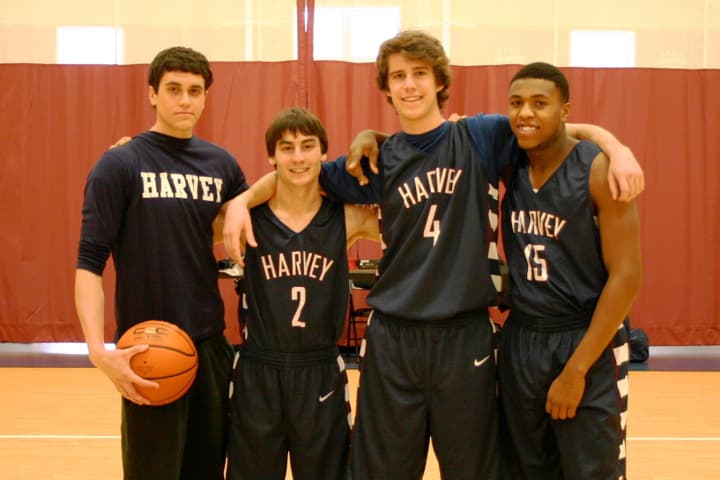 Seniors Andrew Schwartz, Christian Artuso, Jake Cohn and Deshawn Hilliard were honored before the Harvey School&#x27;s recent game.