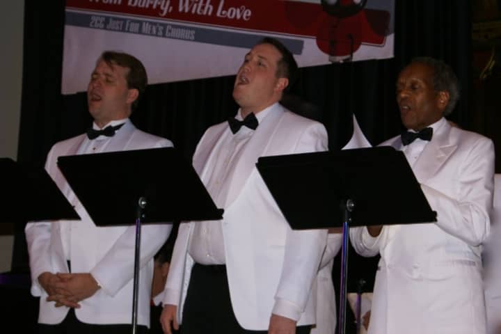 From left, Kreg Gotschall of The Bronx, Jeremiah Patterson of Stamford and Arnold Stancell of Greenwich perform with the Just For Mens Chorus in a tribute to Barry Manilow, a highlight of the 12th annual Second Congregational Church gala.