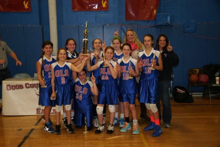 The Our Lady of Sorrows sixth- grade junior varsity girls basketball team completed a 14-0 season.