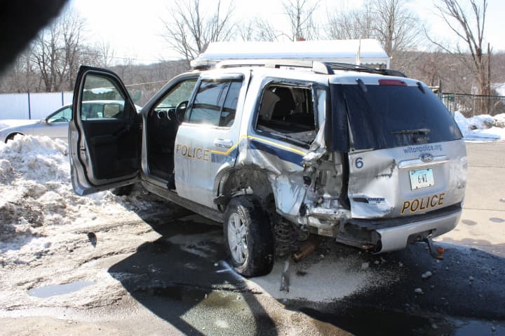 Wilton Police Detective Kip Tarrant was hospitalized Tuesday after his SUV was rear-ended.