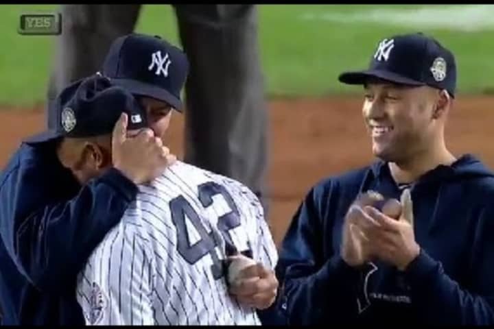 New York Yankee Derek Jeter watches as teammate Mariano Rivera retires last year. 