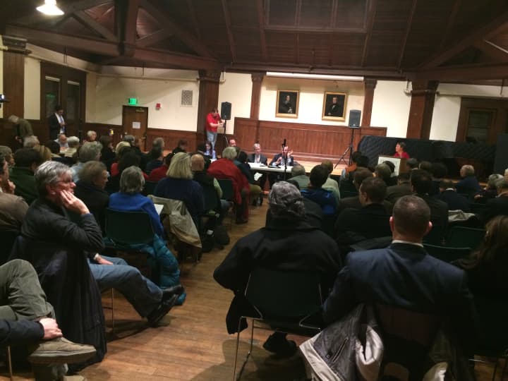 The room at the Pequot Library in Southport is packed with people from all over Fairfield County who want to talk directly to Metro-North and state Department of Transportation representatives about their concerns for train service.