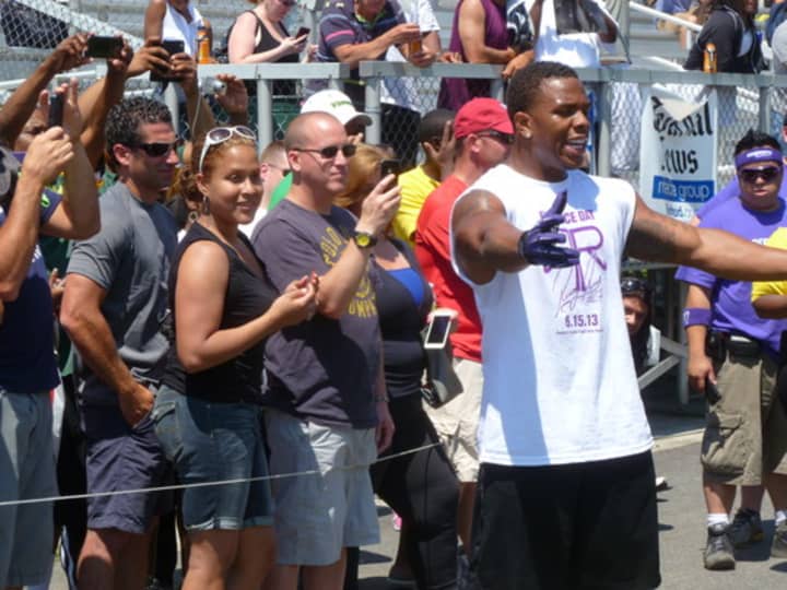 Ray Rice meets fans and parents of his Ray Rice Day football campers. Photo Credit: Danny LoPriore