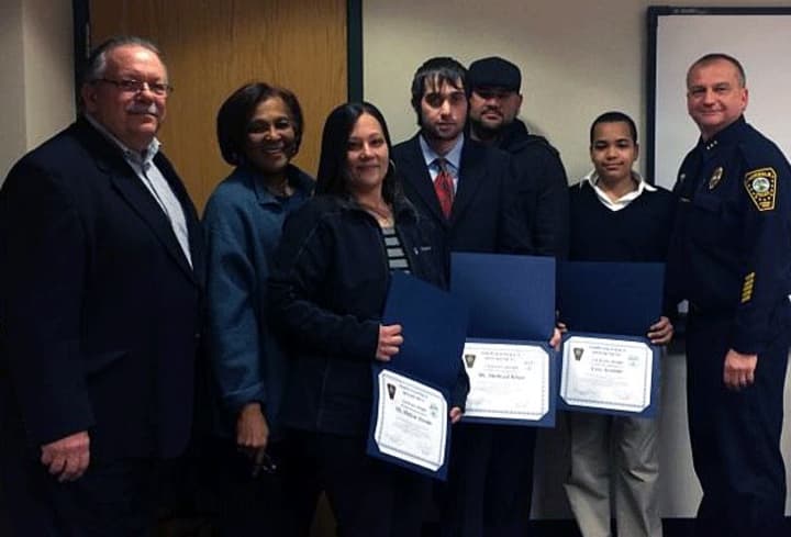 Melissa Acevedo, Victor Monte, Sahzad Khan and Cory Acevedo were joined by members of the Norwalk Police force, who honored them for their life-saving actions. 