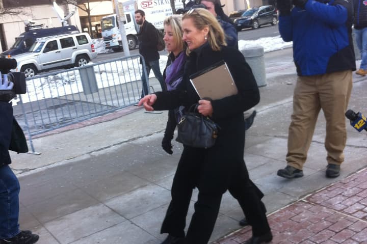 Kerry Kennedy, accompanied by her sister Rory, exits the Westchester County Courthouse in White Plains on Wednesday.