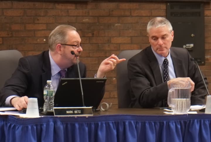 Mike Betz (left), assistant superintendent for business and administrative services, and Jerry Hochman (right) school superintendent, present the 2014-2015 preliminary budget. 