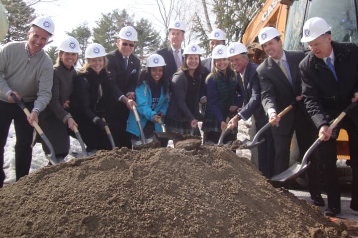 Local officials, trustees and students of the School of the Holy Child in Rye break ground on a new field house, theater and workshop.