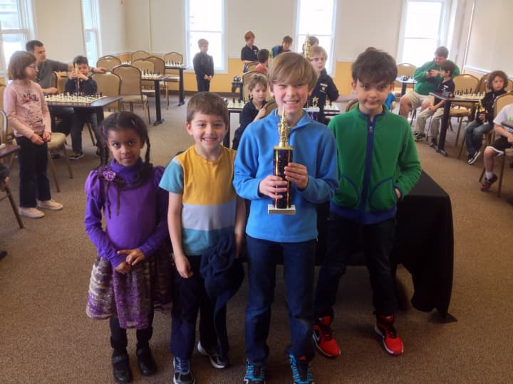 From left: Tiffany Jennings, Cyrus Pearson, Justin Higgins and Jackson Benett placed second in a recent chess tournament. 