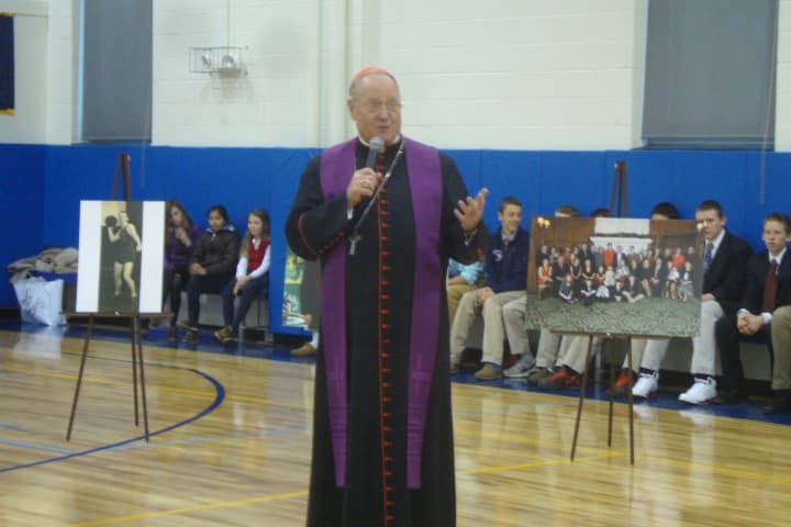 Cardinal Timothy Dolan praises George and Marie Doty and the new gym built in their memory at the Resurrection School in Rye.