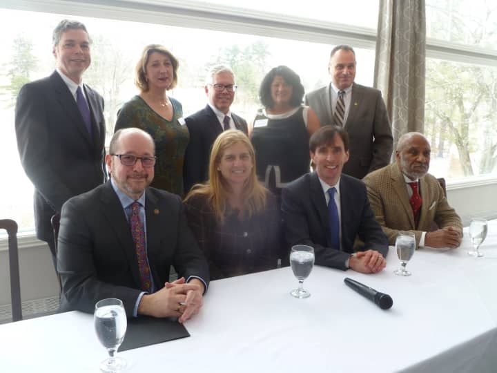 The Women&#x27;s Council of Realtors President Roseann Paggiotta, back row second from right, welcomed six mayors and representatives to the group&#x27;s meeting. The moderator, Leah Caro, Principal Broker of Bronxville-Ley Real Estate, second from left, back.