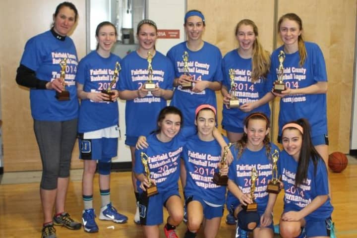 Coach Erin McHugh and the Darien 8th grade girls basketball team won the season-ending tournament in the Fairfield County Basketball League.