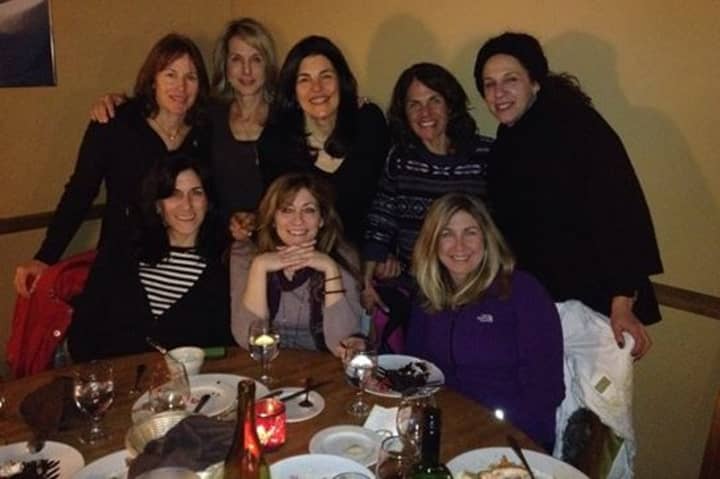 Laura Mogil and friends enjoy a dinner during a girls weekend away in Vermont.