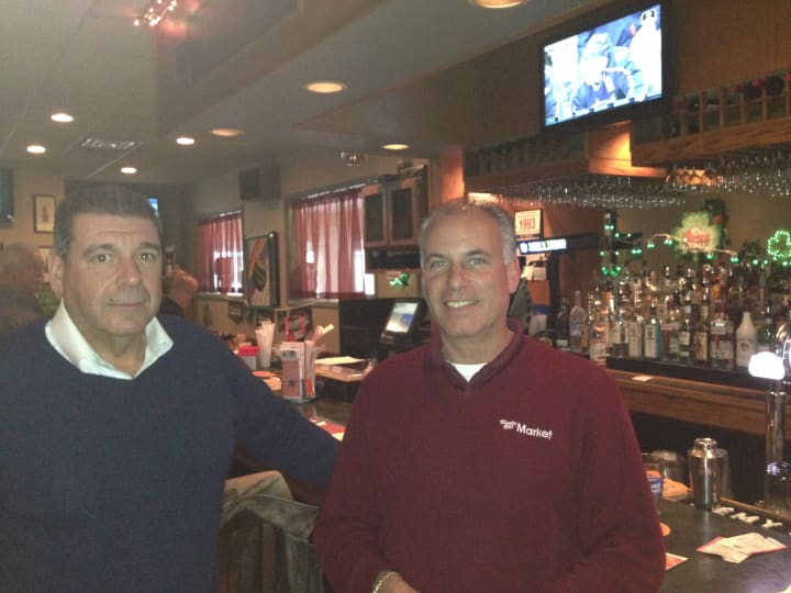 Joe Ponsrock (left) and Paul Sussmann (right) talk about the Metro-North explosion at Somerfields in Somers.