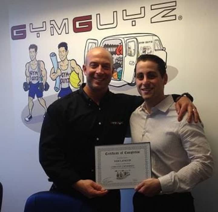 GYMGUYZ CEO and Founder Josh York and his first franchuse owner Sam Langer of Irvington.