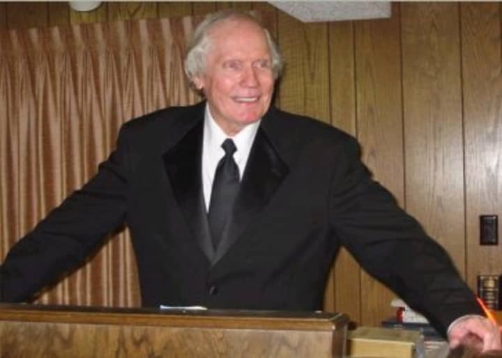 Fred Phelps Sr. at his pulpit prior to his excommunication from Westboro Baptist Church, which he started.
