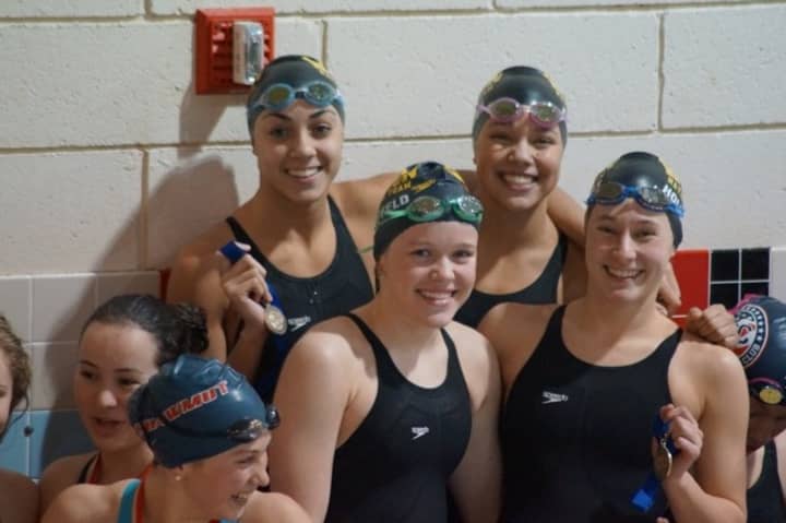 Norwalk&#x27;s  Ky-lee Perry joins Wilton Wahoo teammates Samantha Cheruk, Emma Holmquist and Emma Kauffeld.  The unit finished third in the 200 free relay.