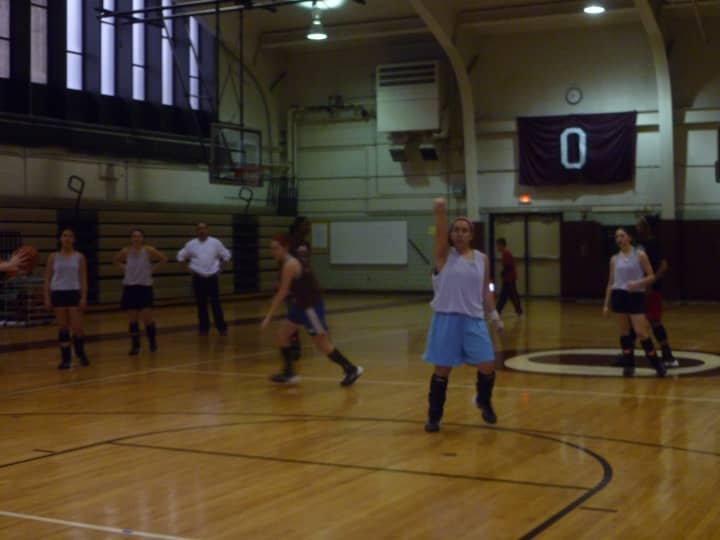 The Ossining girls basketball team is picking the UConn girls to win it all in March Madness. 