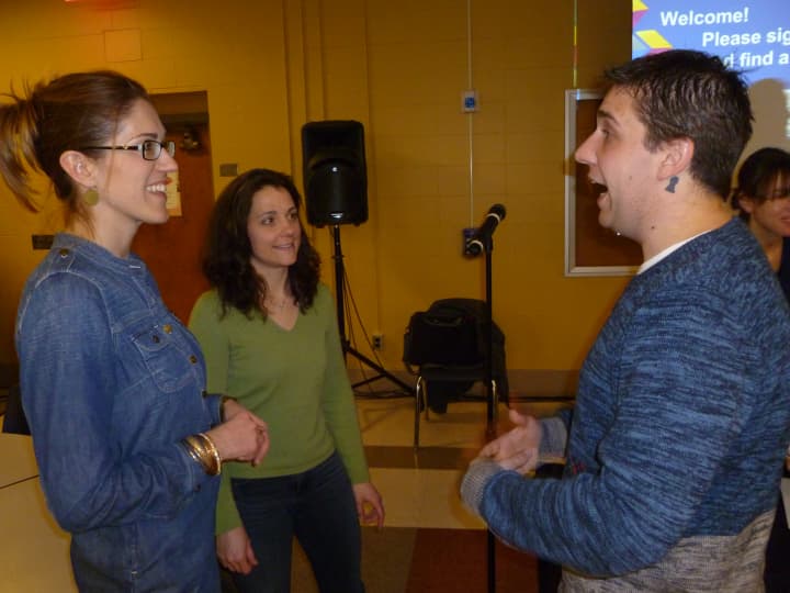 Amanda Greene (left) and Jennifer Maldonado (center) talk to Josh Gunderson (right) after his presentation, Smart Parents, Safe Kids, at Fox Lane High School. 