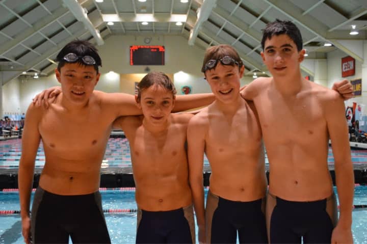 The Greenwich Marlins  11-12 boys relay broke Connecticut and resident records in the 200 freestyle and 400 freestyle relays. Relay members are (left to right) Andres Ruh, Marcus Hodgson, Alex Kosyakov, and Conway Zhou.