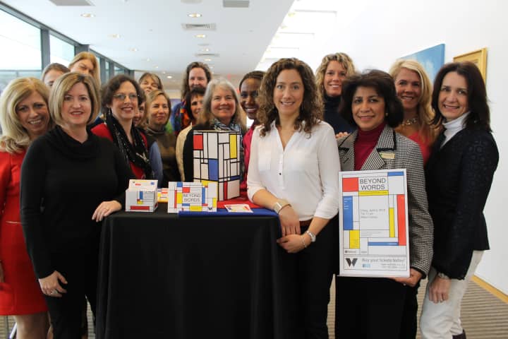 The planning committee for Wilton Librarys Beyond Word benefit pictured above unveils the Mondrian theme of the event.