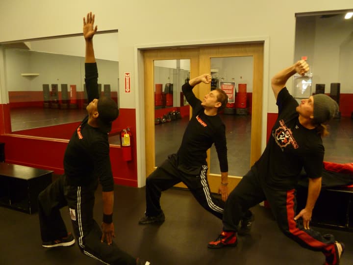 From left, Brandon Durham, Chad Weiss and John Koga display Koga fitness.