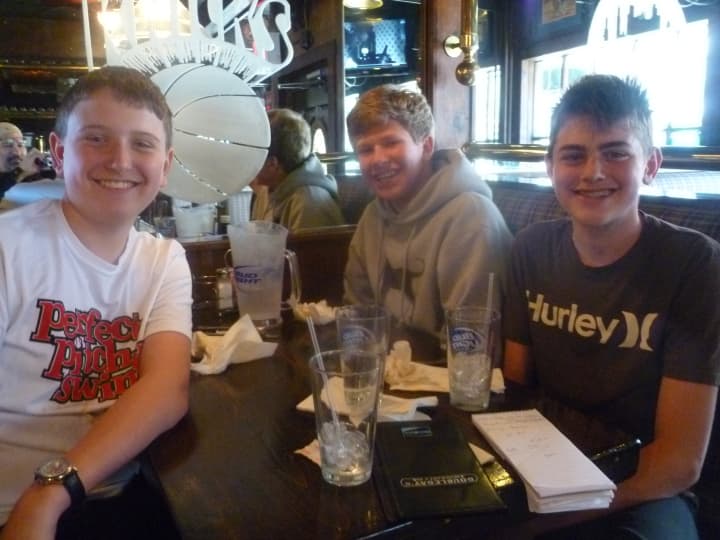 Masters School students George Corrigan of Hastings-on-Hudson, Michael Fitzgerald of Dobbs Ferry and Nick Vern of Mamaroneck  watched Mets opening day at Doubleday&#x27;s restaurant Monday, March 31.
