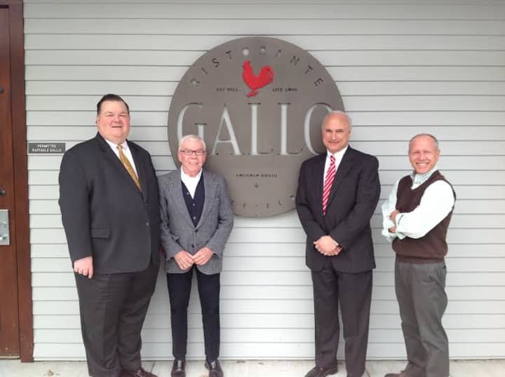 State Rep. John Frey, longtime MOW volunteer Bob Lang, First Selectman Rudy Marconi, and Gallo Business Manager Jeff Hennig will bartend on April 24 to help raise funds for Meals on Wheels Ridgefield.