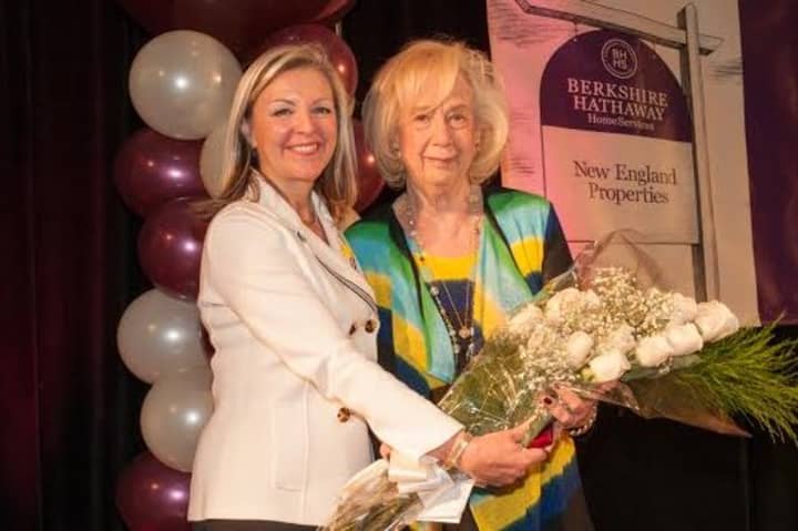 Candace Adams, left,President and CEO of Berkshire Hathaway HomeServices New England Properties honored Elayne Jassey of the Stamford Office  honored with the Pinnacle Award as No. 7 in the U.S. and No. 1 in Connecticut.