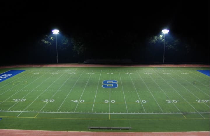 Weston residents are seeking to bring lights to the football stadium at the high school, similar to these lights at Staples High School in Westport. 