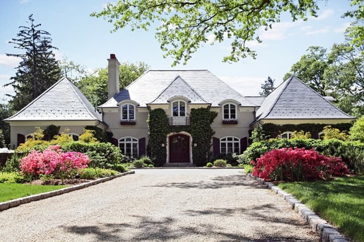 This elegant French Country estate in Purchase is currently on the market for $4,900,000. 