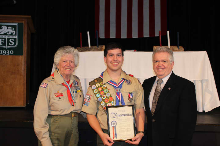 Thelma Barlow, district commissioner for Westchester County Boy Scouts, Eagle Scout Ryan Lowe and Somers Town Supervisor Rick Morrissey.