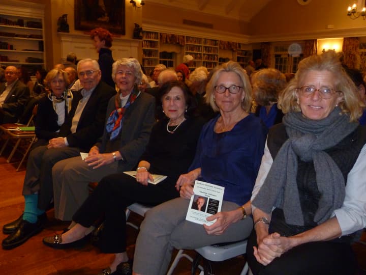 Bedford resident Bronnie Trotta, second from right, waits to listen to a solo performance by Vladimir Feltsman at St. Matthew&#x27;s Episcopal Church in Bedford. 