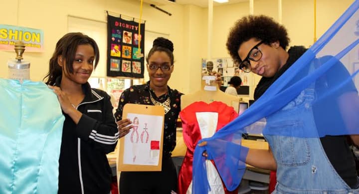 Angella Boyd and Latasha Bonner (of Greenburgh Central) and Kane Young (White Plains) show some of their Food for Fashion projects.