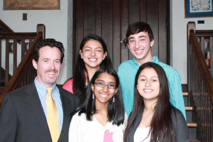 Back row: (from left to right) Audrey Merchan 15, Zachary Karpen 15; Front row: (from left to right) Head of School Matt Byrnes, Drishti Choudhury 15, Isabella Santos 15 after receiving their positions as Wooster School prefects.