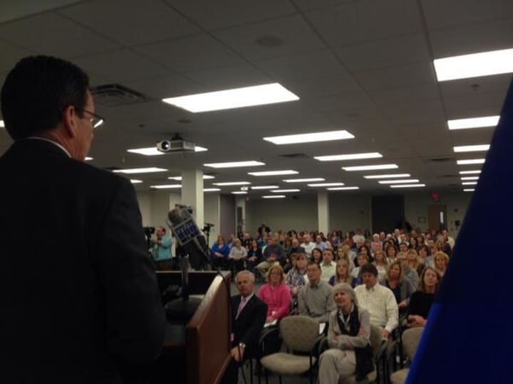 Gov. Dannel Malloy speaks to workers at Cartus, which is planning to expand its offices in Danbury.