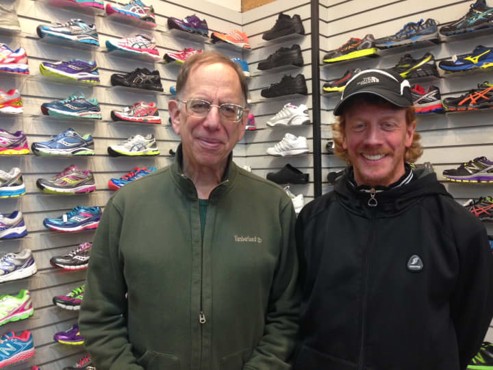 Andrew Kimerling, owner of Westchester Road Runner, and employee Gerry Sullivan.