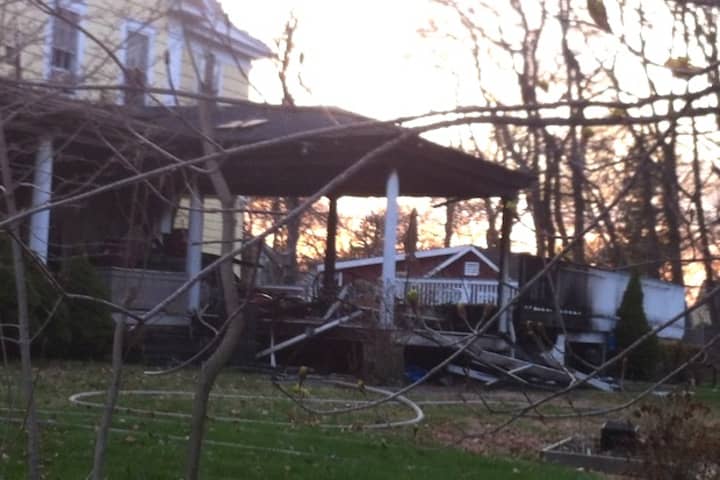 A porch on a house on William Street in Norwalk was destroyed by a fire Monday evening.