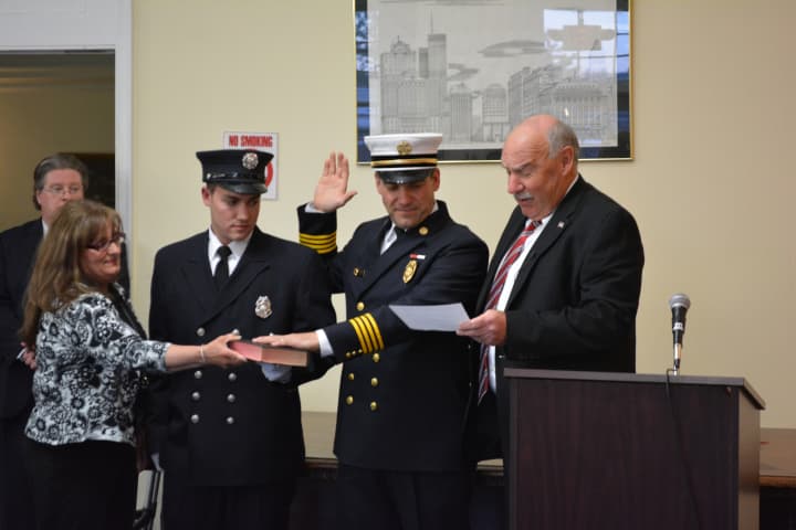 Mount Kisco Fire Chief Mario Muccioli is sworn in.