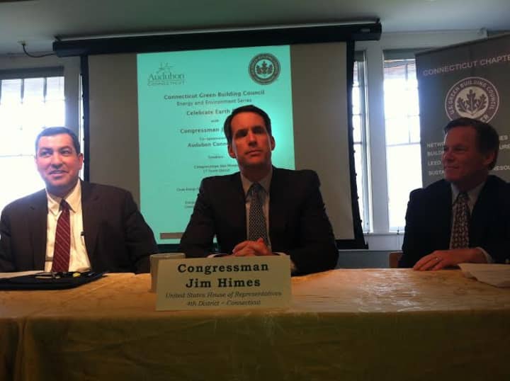 U.S. Rep. Jim Himes, speaks at an Earth Day event in Greenwich. At left is Bryan Garcia, CEO of the Clean Energy Finance and Investment Authority. At right is Stewart Hudson of Audubon Connecticut.