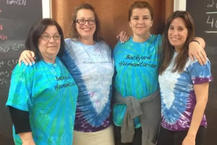 Backyard Humanitarian volunteers (left to right) Bebe Decrescenzo, Paula Egan, Colleen Sharkey and Angela Malizia will lead the group&#x27;s effort in construction of a playground Friday at West Beach in Stamford.