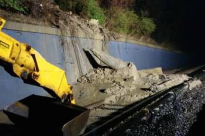 A mudslide in Yonkers caused by heavy rain on Wednesday is causing delays on the Harlem Line.