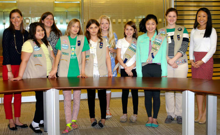 A group of Girl Scouts pose at GEs Corporate location in Stamford.