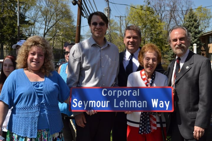Rosalind Lehman, the widow of Seymour Lehman, joins family members, Yonkers Mayor Mike Spano and City Council Minority Leader Michael Sabatino to officially dedicate a portion of Gateway Road in memory of Lehman.