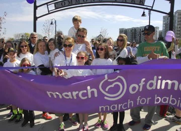 The Morris family cuts the start ribbon at a previous year&#x27;s March for Babies in Stamford. This year&#x27;s event is April 23 at Cove Island Park.
