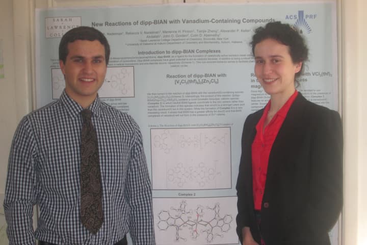 Sarah Lawrence College students Daniel, left, and Rebecca Nadelman display their poster which earned them an award at a chemistry symposium.