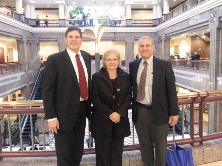Rep. Tom O&#x27;Dea (R-125) is praising the passage of a bill that would provide legal immunity for administering an opioid antagonist drug to an overdosing individual. O&#x27;Dea stands with Jeff Holland and Ingrid Gillespie of Connecticut Prevention Network.